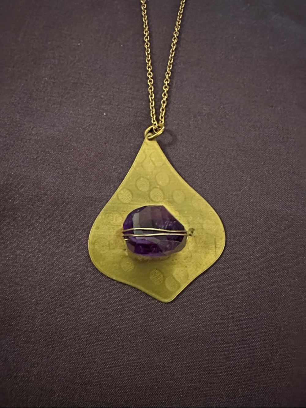 Nashelle Gold Teardrop Pendant with Purple Stone Accent